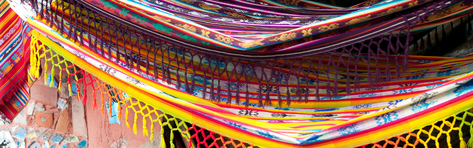 Zoomed in view of vibrant fabrics with detailed patterns